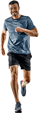Man in blue shirt jogging and smiling